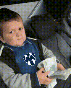 Baby in Blue Shirt With Soccer Ball in Car Seat