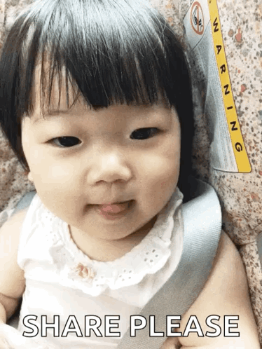 Baby in Car Seat Saying Share Please