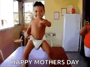 Baby in Diaper Dancing on Table