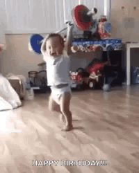 Baby in Diaper Walking on Wooden Floor