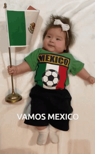 Baby in Green Shirt Saying Mexico