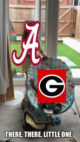 Baby in High Chair With Alabama Logo