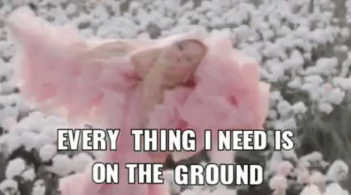 Baby in Pink Dress Lying in Cotton Field