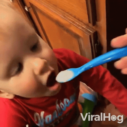 Baby in Red Shirt Fed With Blue Spoon Viralhog