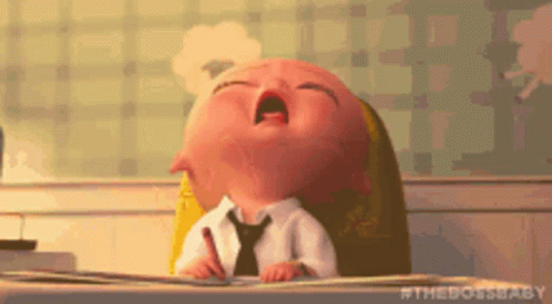 Baby in Suit and Tie Crying at Table