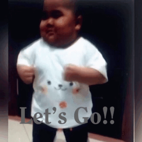 Baby in White Shirt Says Let's Go
