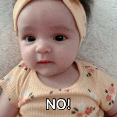 Baby in Yellow Shirt With No on Chest