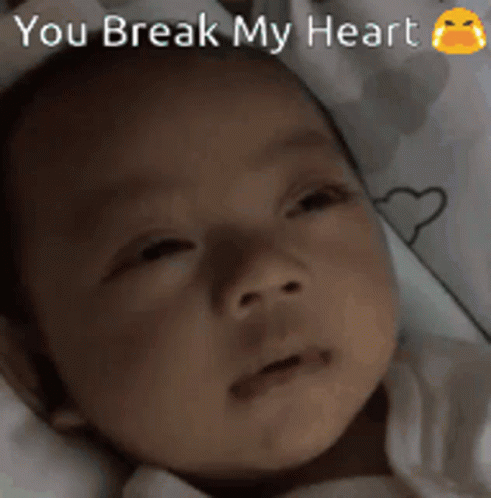 Baby Laying in Crib You Break My Heart