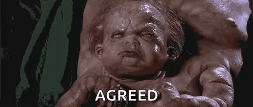 Baby Laying On Bed Saying Agreed GIF