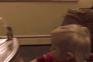 Baby Learning To Use Fountain GIF