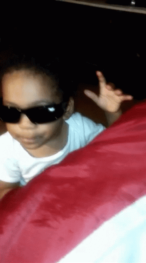 Baby Looks Like Stevie Wonder GIF