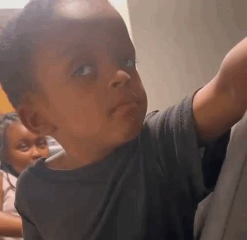 Baby Making Funny Face at Camera