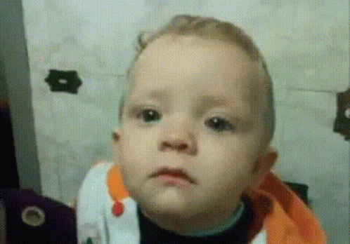 Baby Making Funny Face GIF