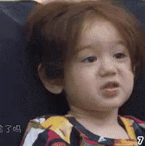Baby Making Funny Face GIF