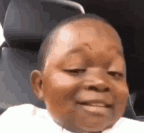 Baby Making Funny Face in Car Seat
