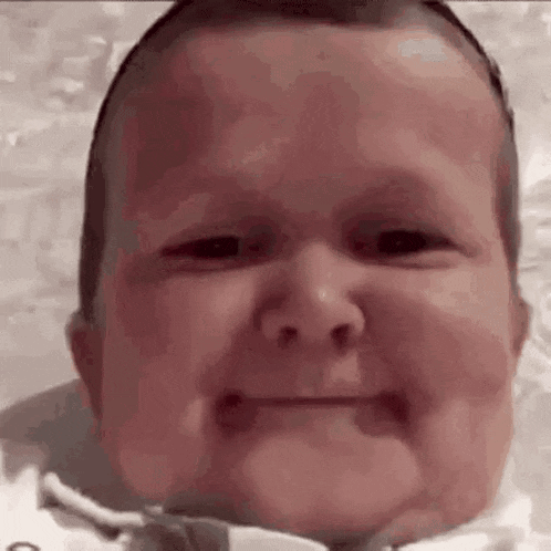 Baby Making Funny Face GIF