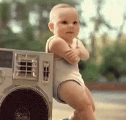 Baby Playing Drums With Man Behind