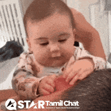 Baby Playing With Red Object on Star Tamil Chat