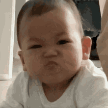 Baby Reacting To Poop Smell GIF