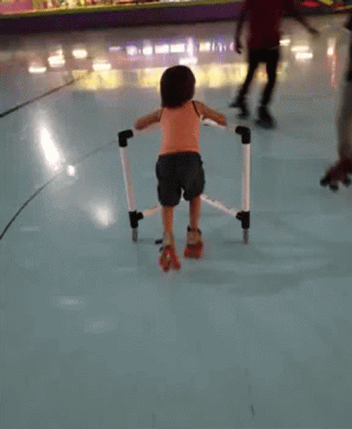 Baby Roller Skating With Support GIF
