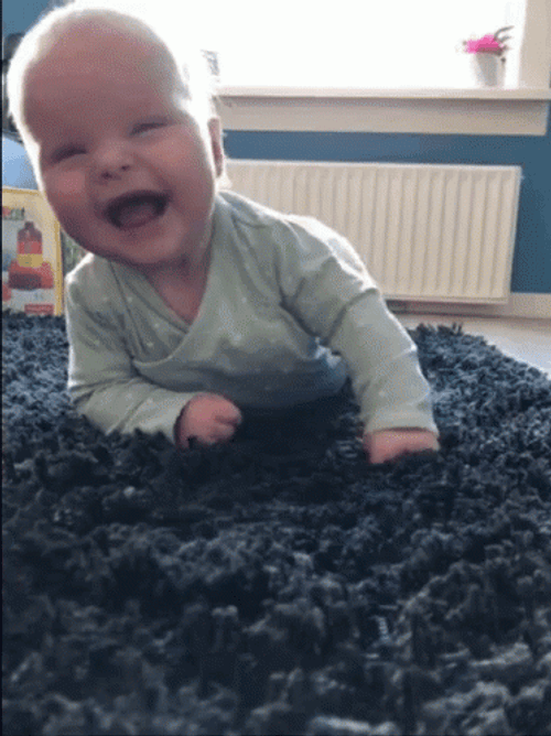 Baby Rolling On The Floor Laughing GIF