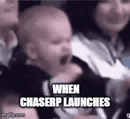 Baby Screaming in Crowd Held by Woman