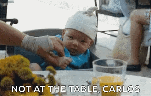 Baby Sitting In High Chair Being Fed GIF