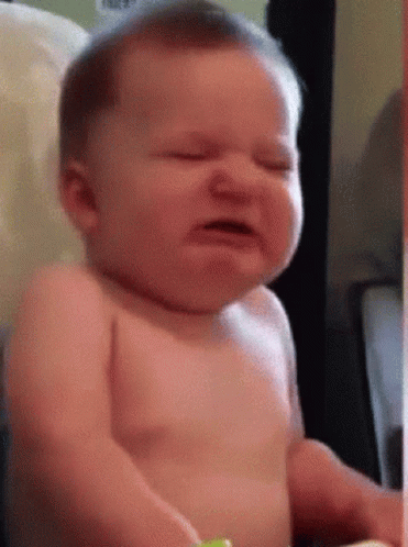 Baby Sitting in High Chair Crying