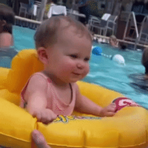 Baby Sitting in Yellow Life Preserver