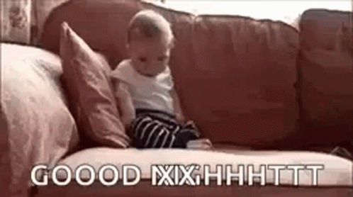 Baby Sitting on Couch Saying Good Iixhhhhtt