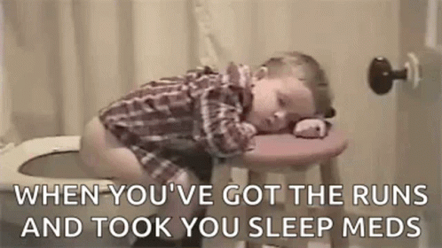 Baby Sleeping on Stool on Toilet