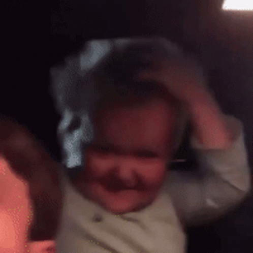 Baby Smiling and Making Funny Face