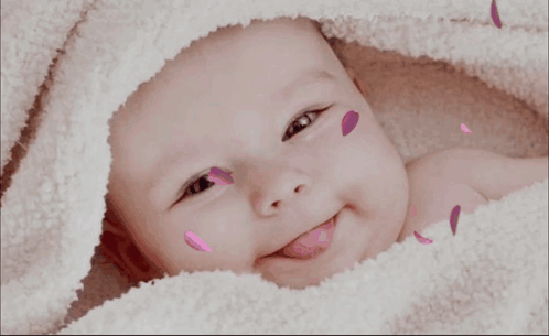 Baby Smiling With Petals Günaydın
