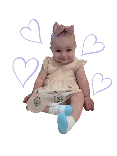 Baby Surrounded by Purple Hearts