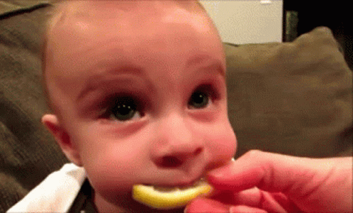 Baby Tasting Lemon GIF