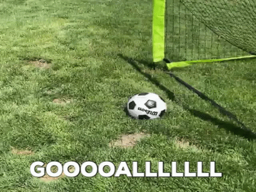 Baby Walking Past Goal Sign