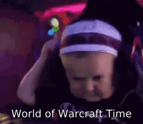 Baby Wearing Headband and Hat Says World of Warcraft Time