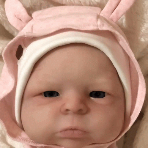 Baby Wearing Pink Hat With Ears