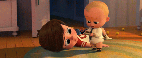 Baby with D Shirt Lying on Floor