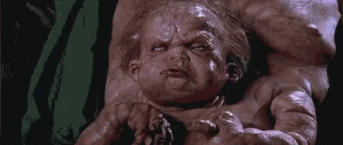 Baby With Huge Head Held GIF