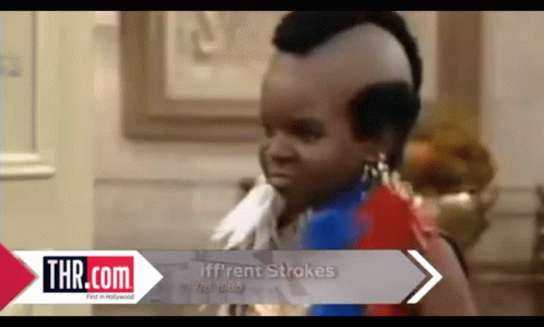 Baby With Mohawk Held By Woman With Thr.com GIF