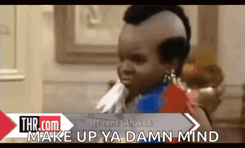 Baby With Mohawk Saying Make Up Ya Damn Mind GIF
