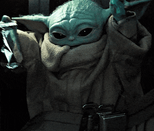 Baby Yoda From The Mandalorian Raising Hands With A Shiny Thing Gif GIF