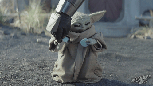 Baby Yoda Holding Grugu