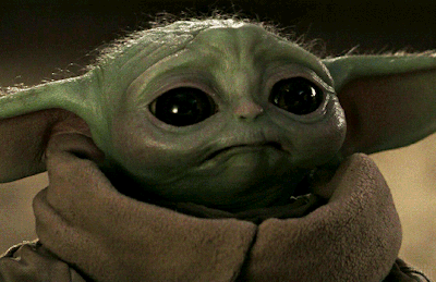 Baby Yoda Looking at Camera