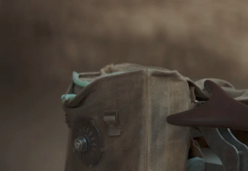 Baby Yoda Looking Out of Box with Screw