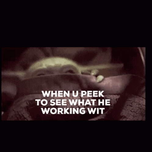 Baby Yoda Peeking to See What He's Working
