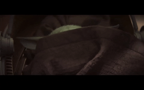 Baby Yoda Removing Cover GIF