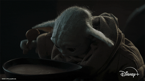 Baby Yoda Scooping Soup GIF