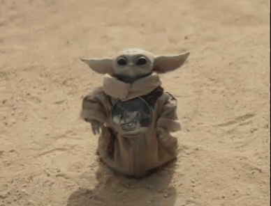 Baby Yoda Standing in Desert Holding Shield